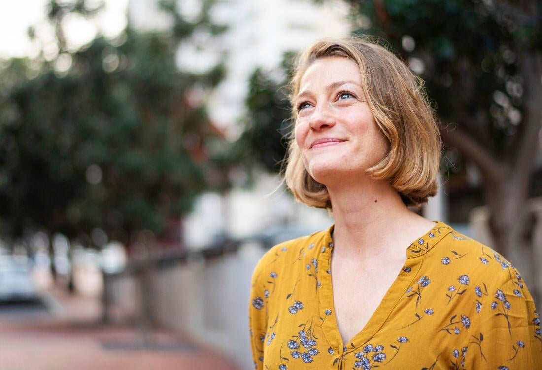 woman-smiling-and-hopeful-for-the-future